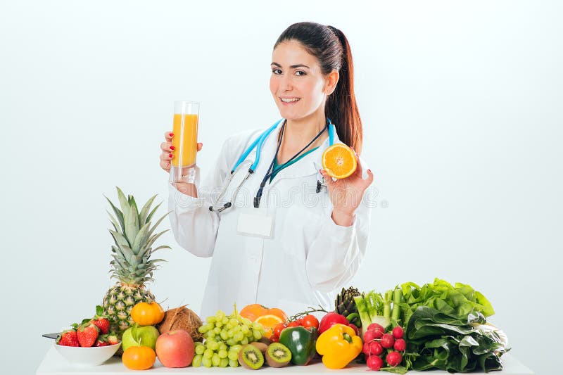 Female dietitian in uniform with stethoscope royalty free stock images