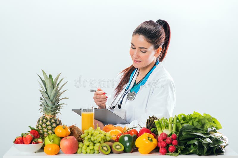 Female dietitian in uniform with stethoscope royalty free stock photography