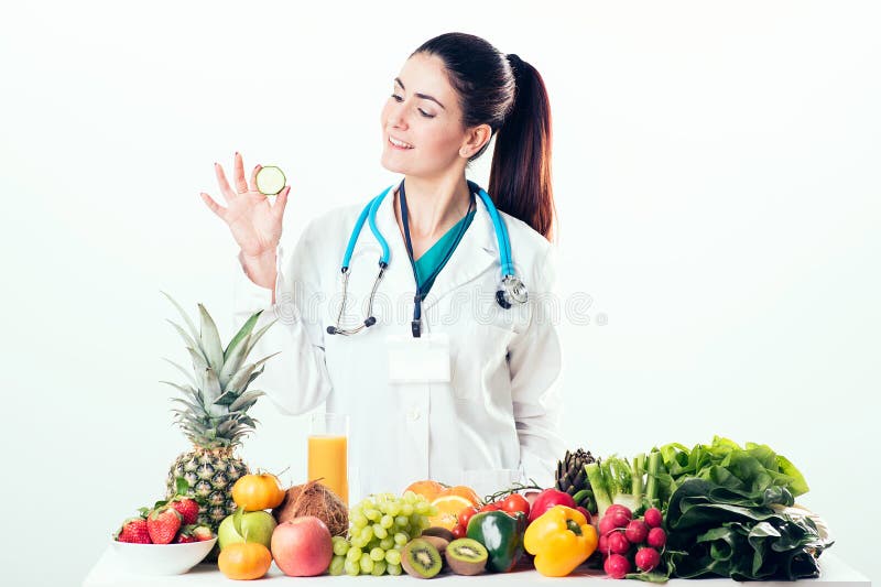 Female dietitian in uniform with stethoscope royalty free stock image