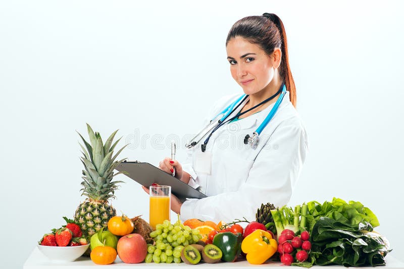 Female dietitian in uniform with stethoscope stock photography