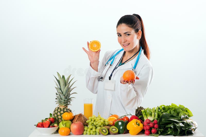 Female dietitian in uniform with stethoscope stock photos