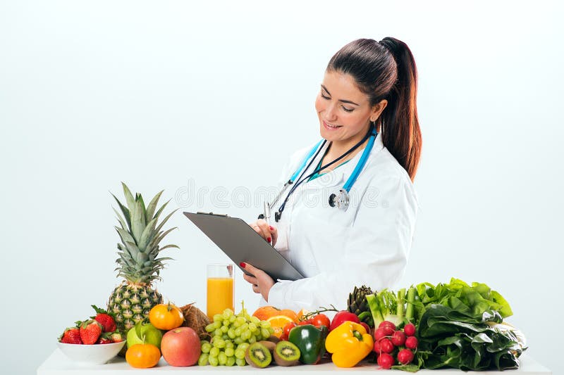 Female dietitian in uniform with stethoscope royalty free stock photo