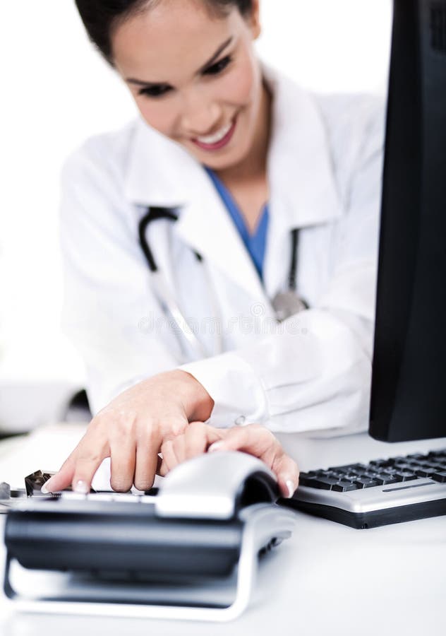 Female doctor dialing the phone royalty free stock photo