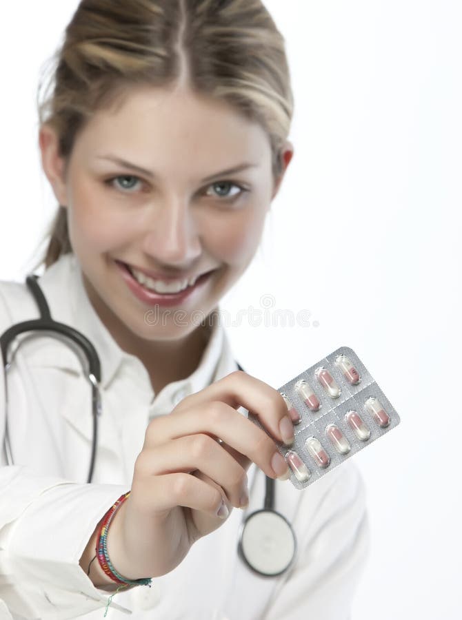 Female doctor handing medicine