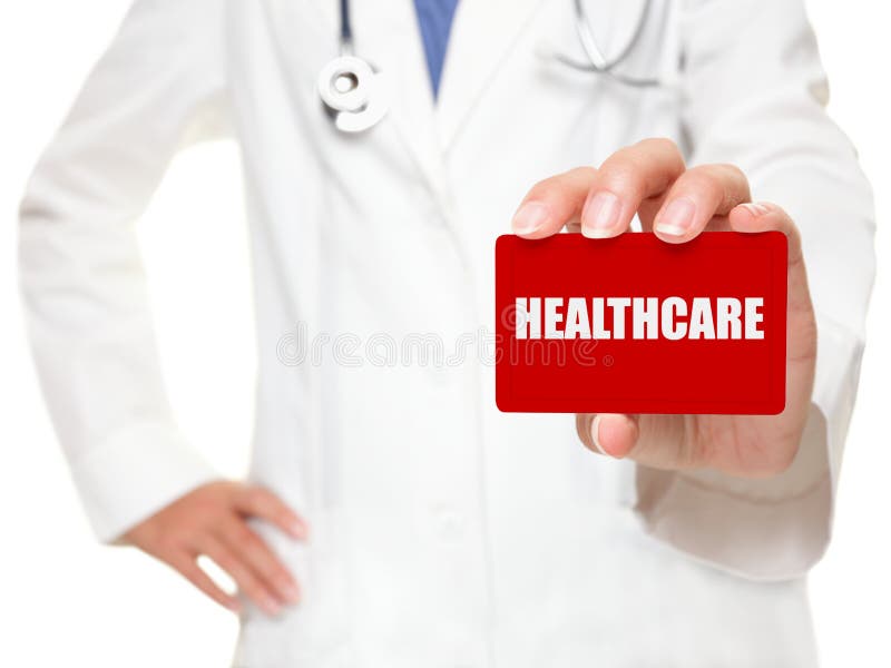 Female doctor holding HEALTHCARE card