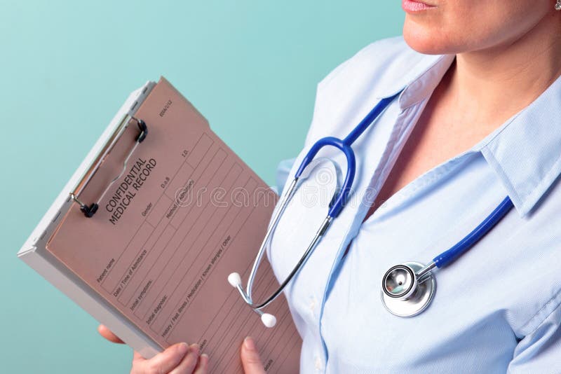 Female doctor holding medical record