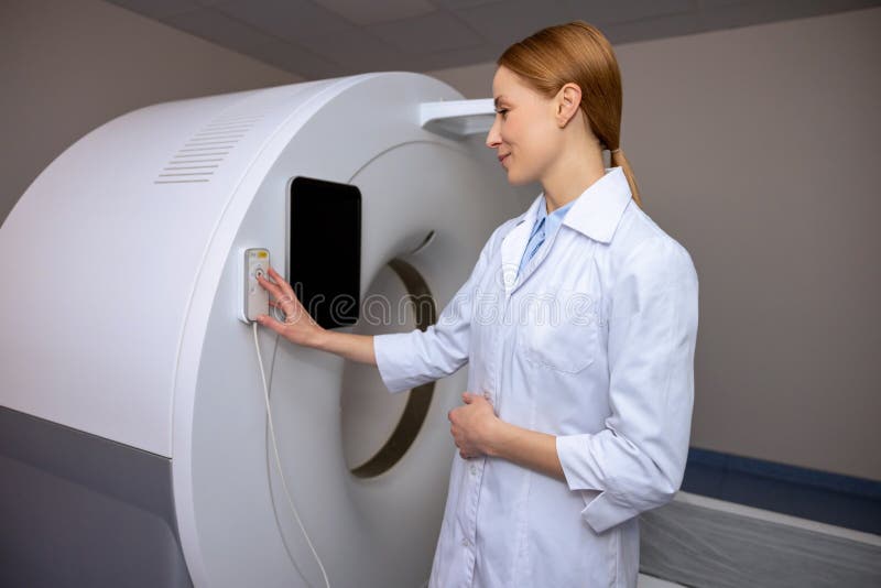 Female Doctor in Resonance Imaging or Computed Tomography Room