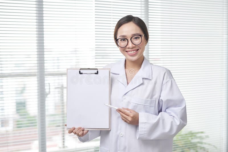 Female Doctor Show with Clipboard Stock Image Image of young, stethoscope 144103955