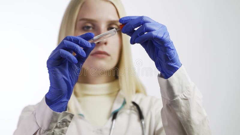 Female Doctor taking smear test, Covid-19 Coronavirus concept