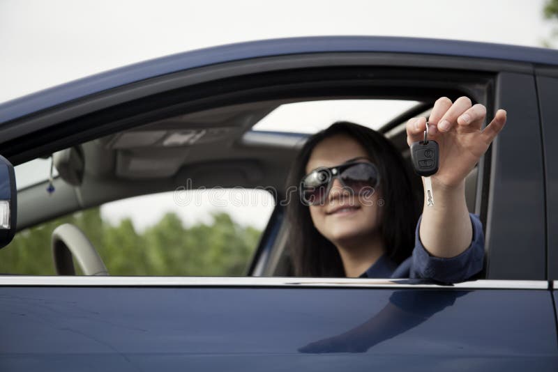 Female driver stock image. Image of casual, leasing, multiracial 64299085