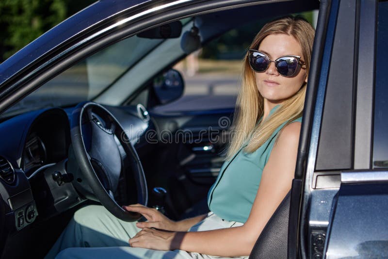 Woman Driving Car Sunglass Stock Photos - Free & Royalty-Free Stock Photos  from Dreamstime
