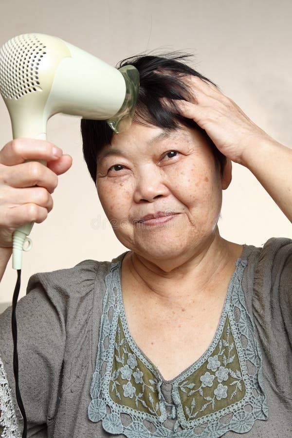 Female drying her hairs stock image. Image of joyful 20336347