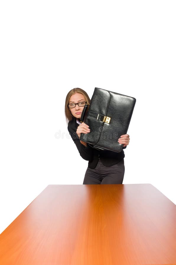 Female employee sitting at long table isolated on white stock photo Female employee sitting at long table isolated on white stock photo