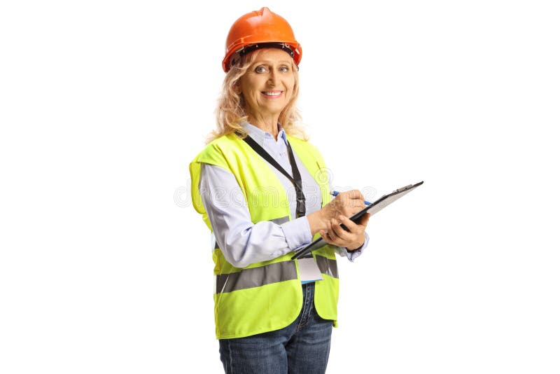 Female Engineer with a Safety Vest and Helmet Holding a Document and Looking at Camera Stock