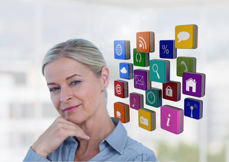 Female executive standing with hands on chin and appliction icons royalty free stock photo Female executive standing with hands on chin and appliction icons royalty free stock photo