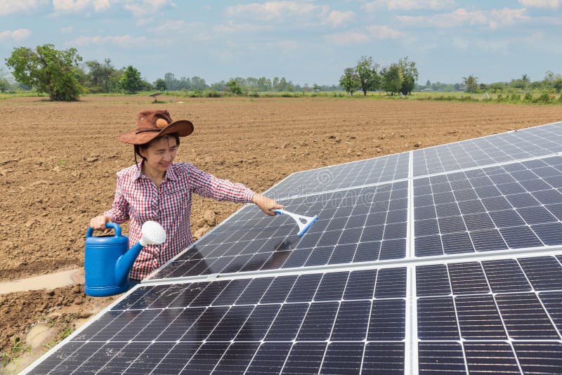 Female Farmer Cleaning Solar Panels in Farm Stock Image Image of cleaning, equipment 246276651
