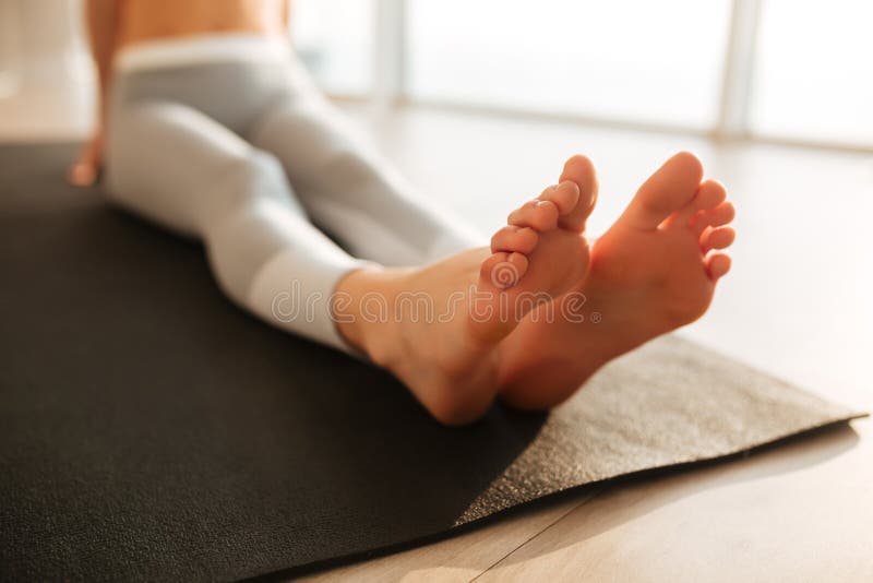 Female Feet on Yoga Mat at Home Stock Photo - Image of lifestyle