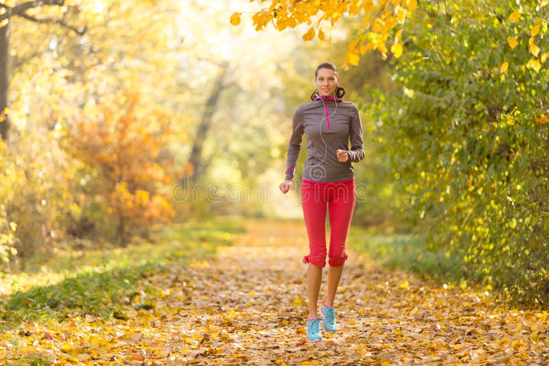 Female Fitness Model Training Outside and Running Stock Photo - Image ...