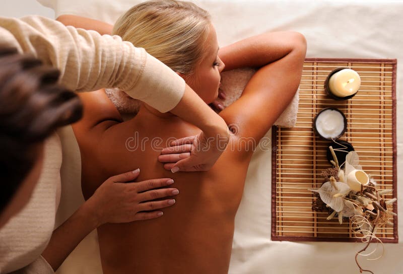 Female getting relaxation massage in beauty salon stock photos Female getting relaxation massage in beauty salon stock photos