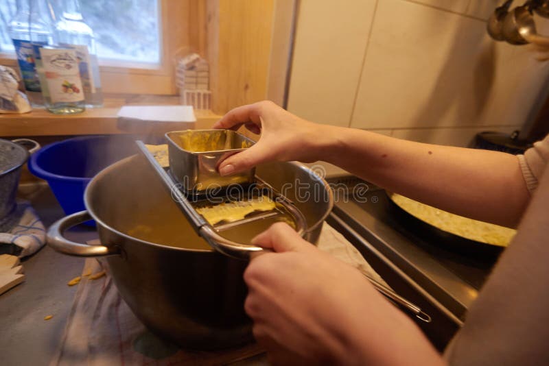Female Grating Butter into the Boiling Water Stock Image Image of