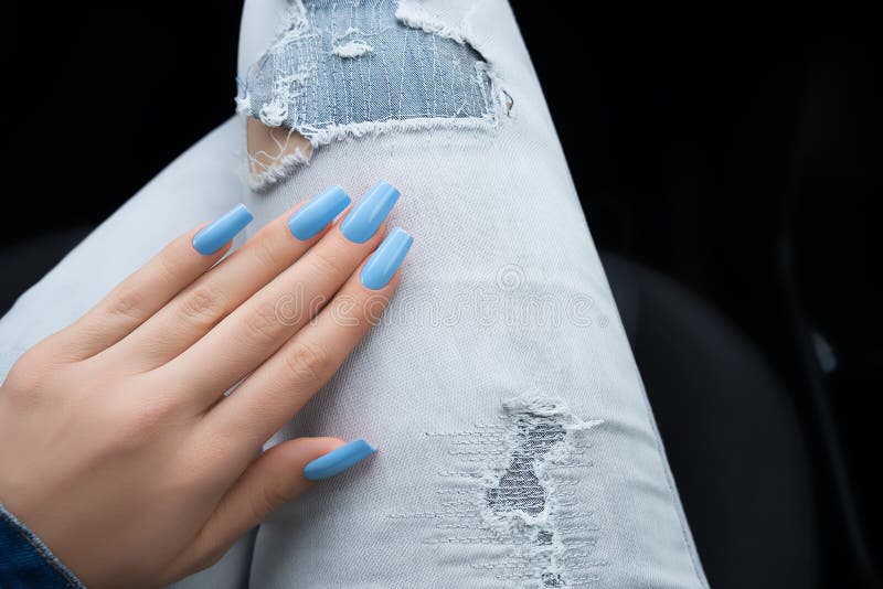 Female Hand with Blue Long Nail Design. Glitter Blue Nail Polish ...