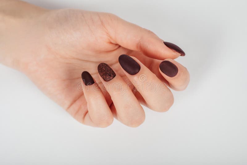 Female Hand with Brown Nail Design. Brown Glitter Nail Polish Manicure. Woman Hand. Stock Image - Image of background, polish: 200728185 Female Hand with Brown Nail Design. Brown Glitter Nail Polish Manicure. Woman Hand. Stock Image - Image of background, polish: 200728185