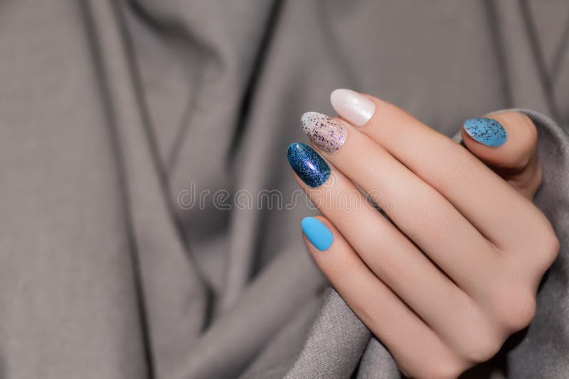 Female Hand With Glitter Nail Design. Blue Nail Polish Manicure Stock Image  - Image Of Elegance, Closeup: 203774139