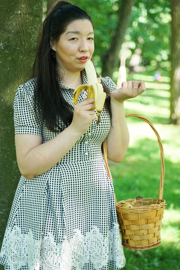 386 Asian Girl Eating Banana Stock Photos Free And Royalty Free Stock