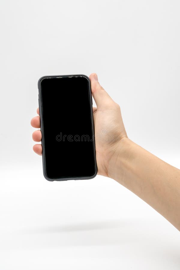Female Hand Holding Black Mobile Phone With Black Screen Stock Image