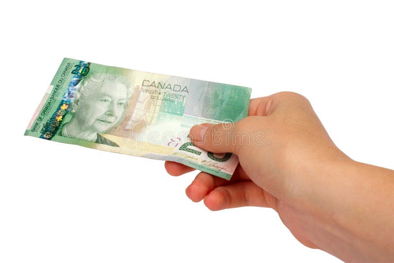 Female hand holding Canadian money