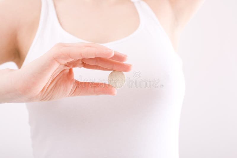 Female hand keeping the pill stock photography