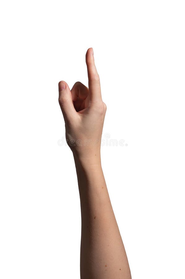 Female hand pointing with index finger extended, gesture symbolizing direction, selection, or stock photo