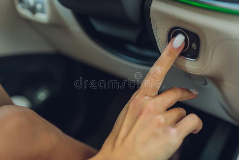 Female Hand with Start Key Inside Car. Stock Image Image of button