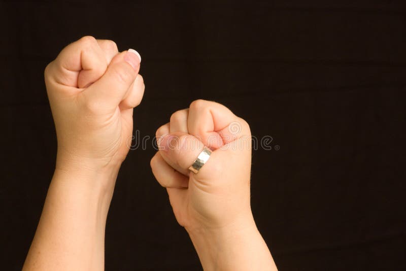 Female Hands Clenched Into Fists Ready For A Fight Stock Photo Image