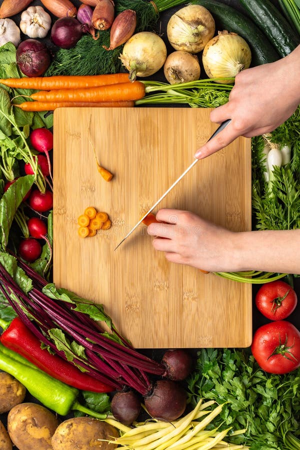 https://thumbs.dreamstime.com/b/female-hands-cutting-organic-carrot-chef-knife-wooden-chopping-board-female-hands-cutting-organic-carrot-chef-knife-151866385.jpg