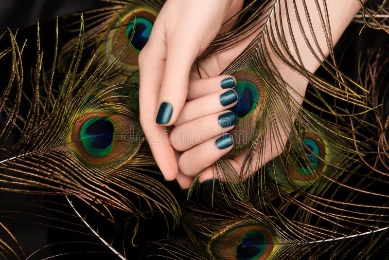 Peacock feather accent nail on dark blue manicure - wide 8