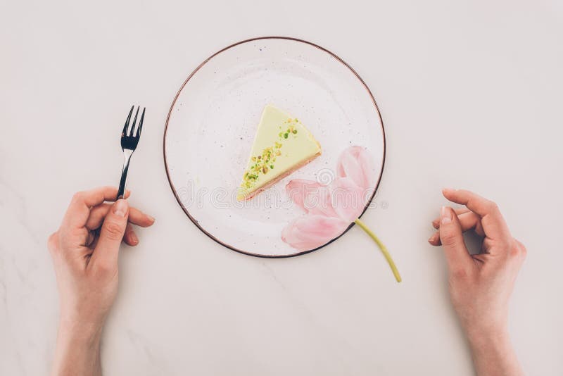 Download Female Hands, Flower And Piece Of Cake On Plate On White Tabletop Stock Image - Image of alone, tabletop: 109247857