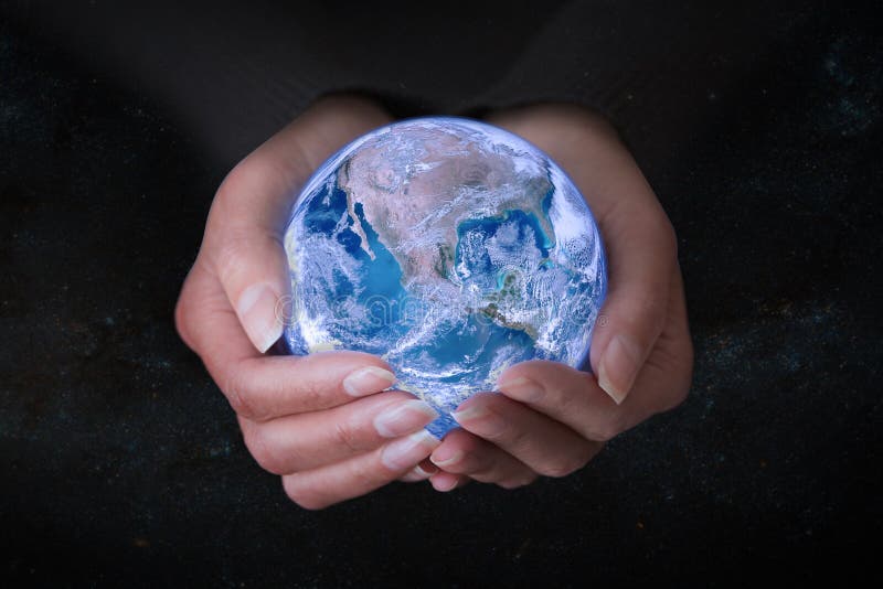 Female hands holding Earth in outer space, concept save the world royalty free stock photography