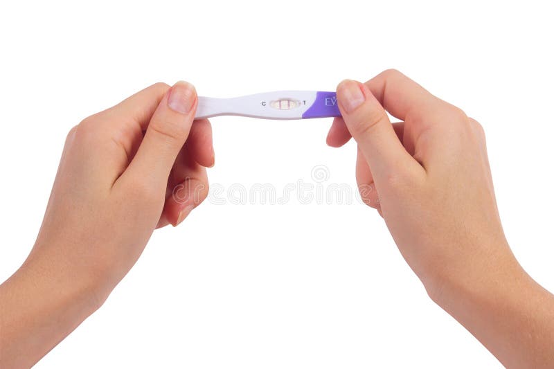 Female hands holding positive pregnancy test