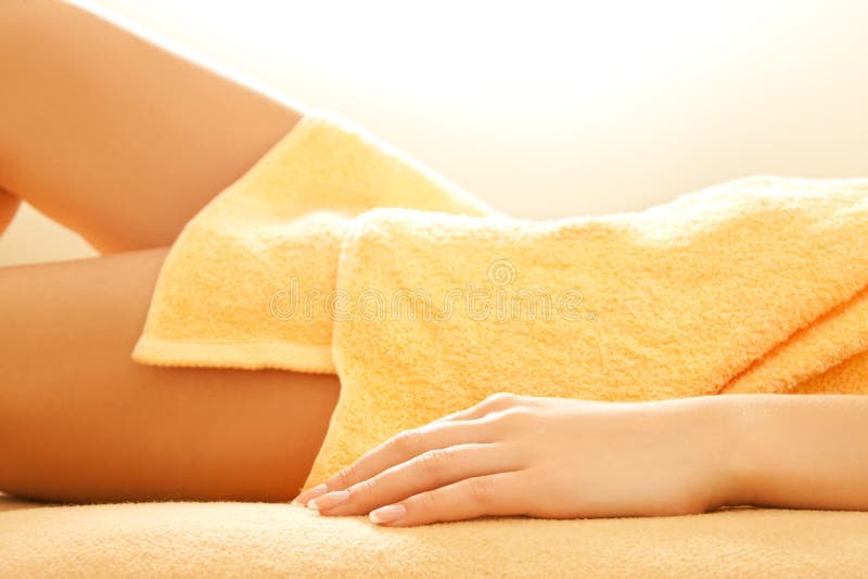 Female hands and legs in spa salon stock image Female hands and legs in spa salon stock image