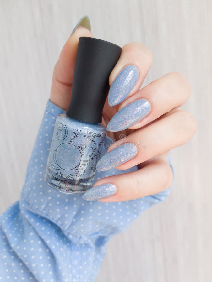 Download Female Hands With Long Nails With Blue Nail Polish Stock Photo - Image of glamour, creative ...