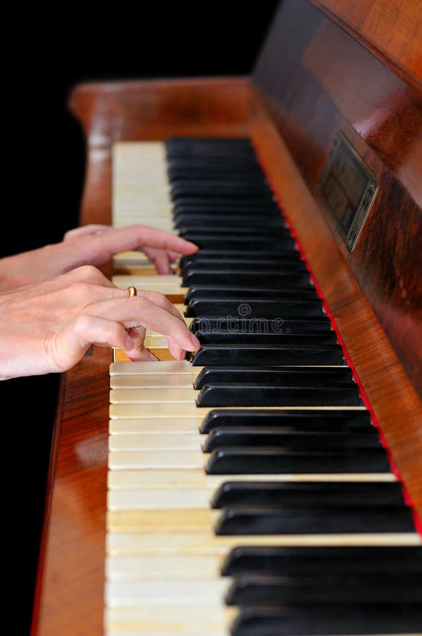 Female hands playing piano stock image. Image of keyboard - 14105571