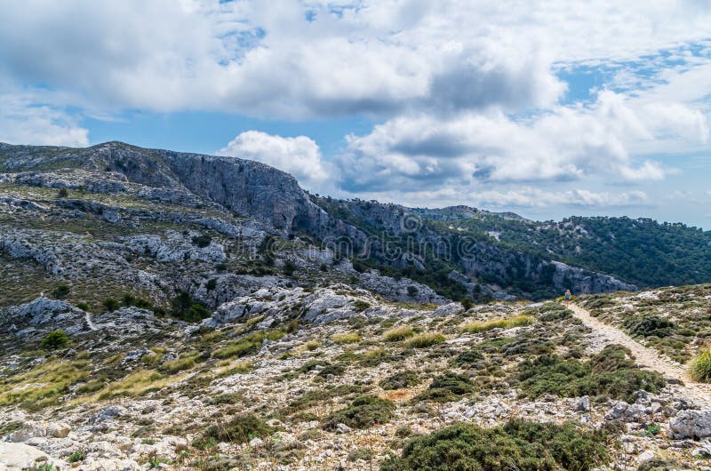 Female hiking in the mountains of Tramuntana, Mallorca, Baleares, Spain royalty free stock photography Female hiking in the mountains of Tramuntana, Mallorca, Baleares, Spain royalty free stock photography