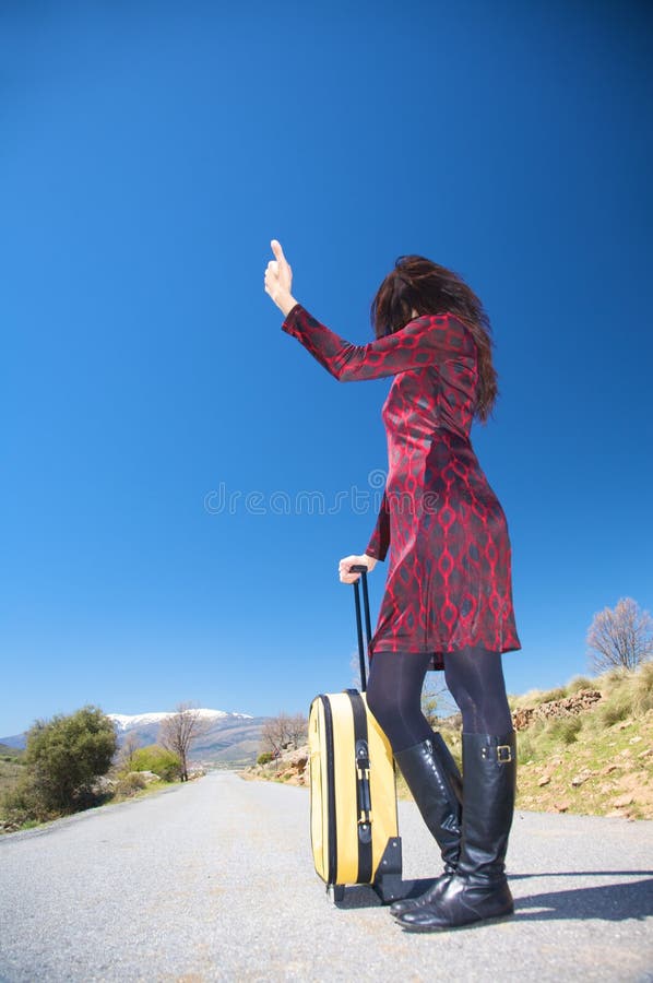 Female hitchhiker stock photo. Image of rural, greenery 5091008