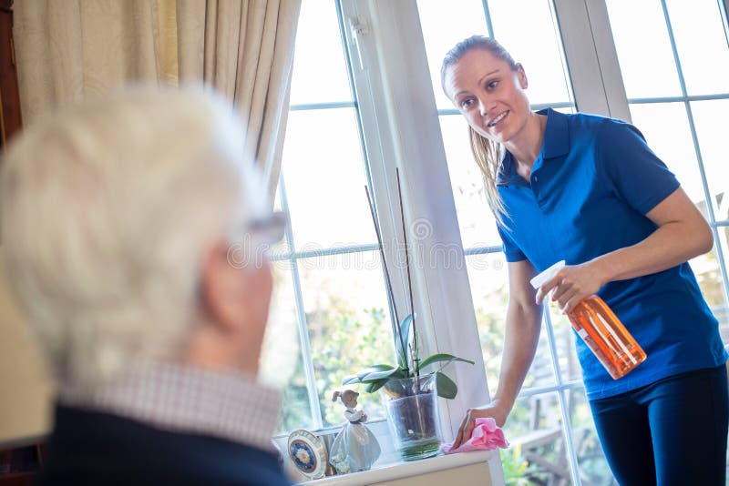 Female Home Help Cleaning House for Senior Man