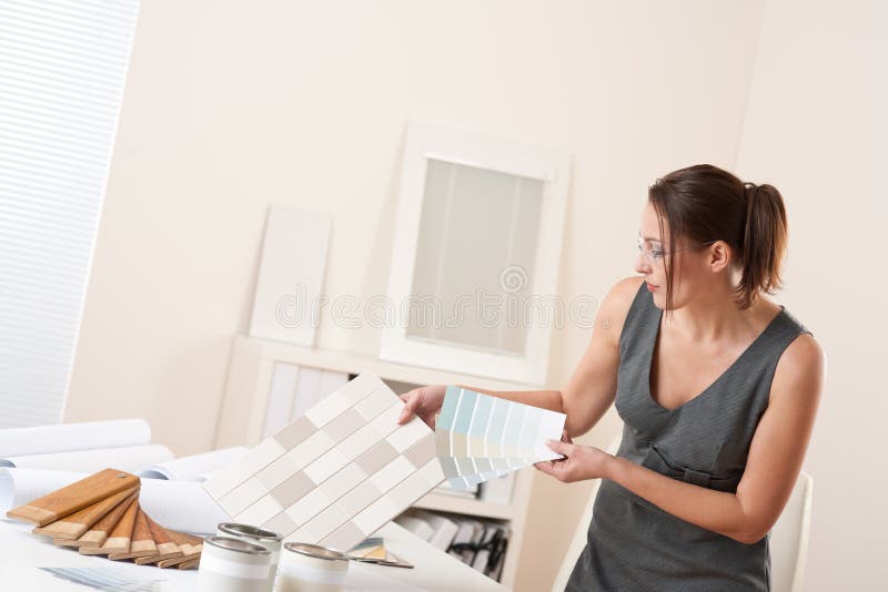Female interior designer working at office royalty free stock images