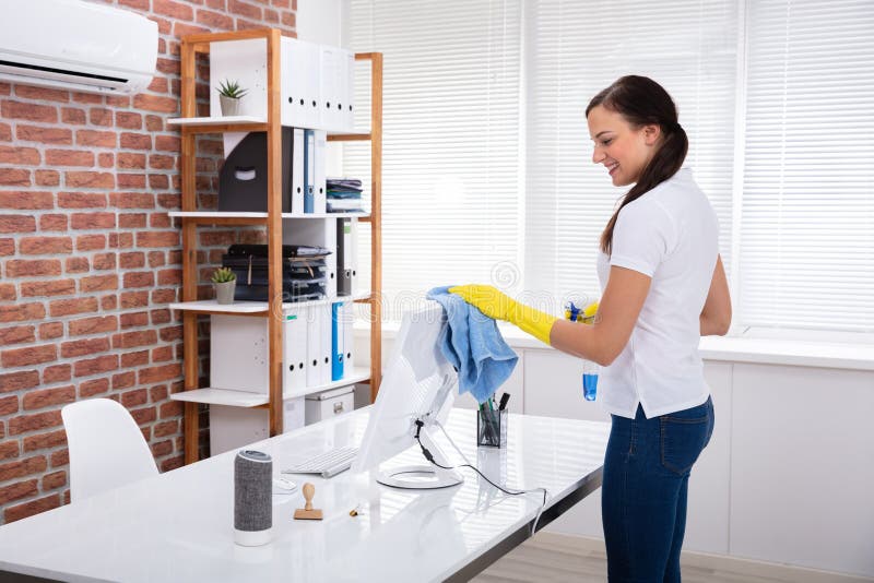 Female Janitor Cleaning Computer in Office Stock Image Image of