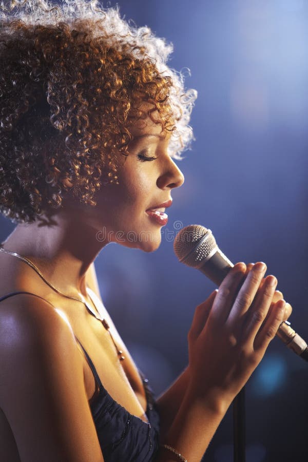 Female Jazz Singer On Stage stock image Female Jazz Singer On Stage stock image
