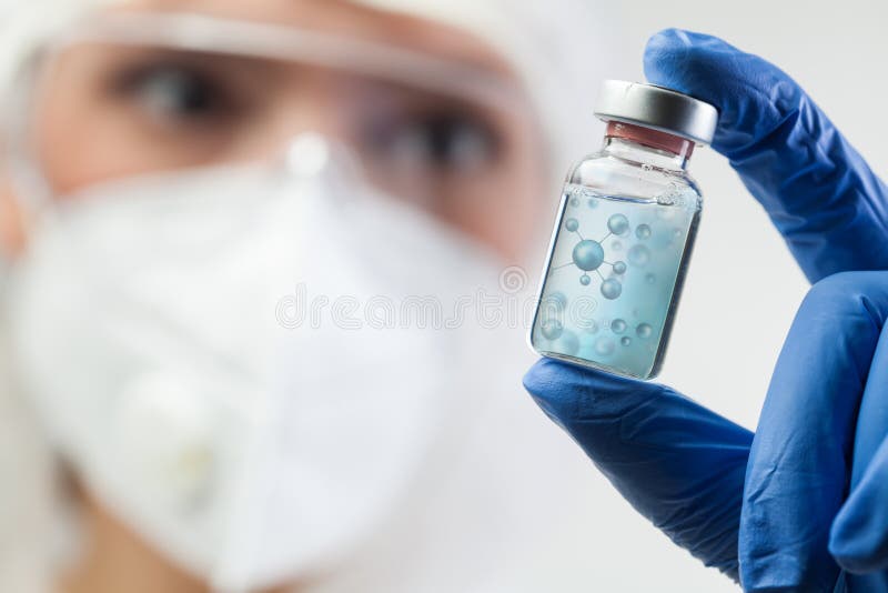 Female lab scientist, microbiologist or biochemist woman holding glass ampoule bottle phial royalty free stock photos