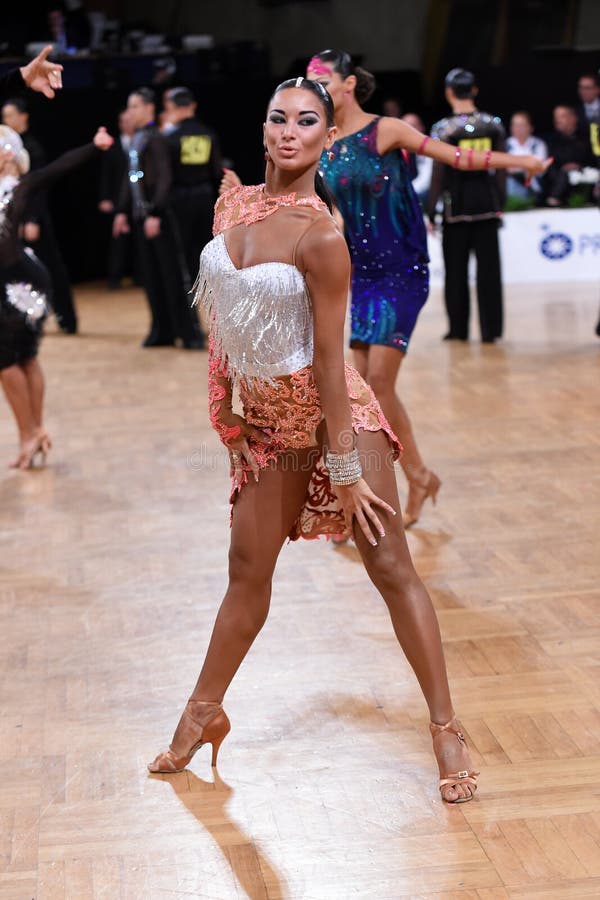 Female latin dancer dancing during competition